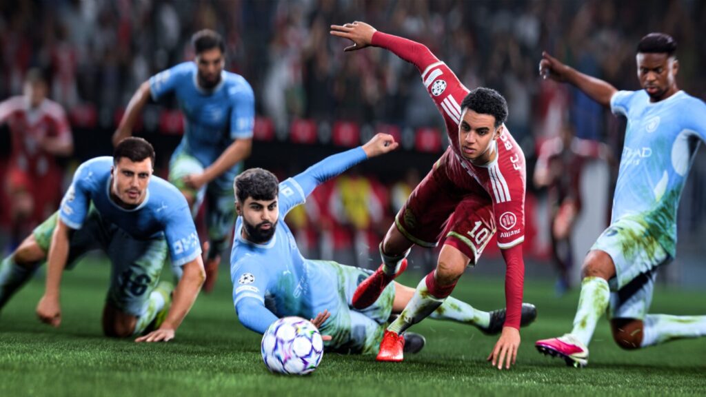 EA Sports FC 27: spelers in lichtblauw en rood liggen in een kluwen op het gras rond de bal